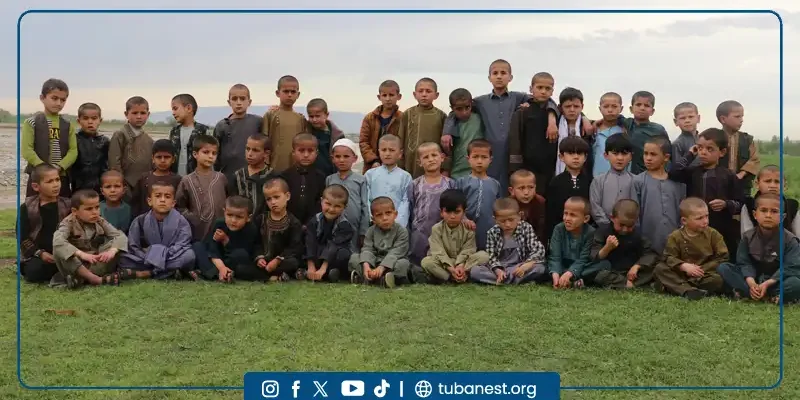 Children Of Tuba Nest Participating In Organized Sports Activities Including Warm-up Exercises And Football Training In Takhar Province, Afghanistan.