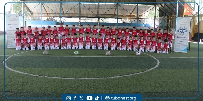 Children Participating In A Sports And Recreational Program Organized By Tuba Nest In Taloqan, Including Football Activities And A Joyful Shir Yakh Treat, Promoting Health, Happiness, And Child Development.