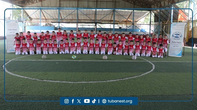 Children participating in a sports and recreational program organized by Tuba Nest in Taloqan, including football activities and a joyful Shir Yakh treat, promoting health, happiness, and child development.