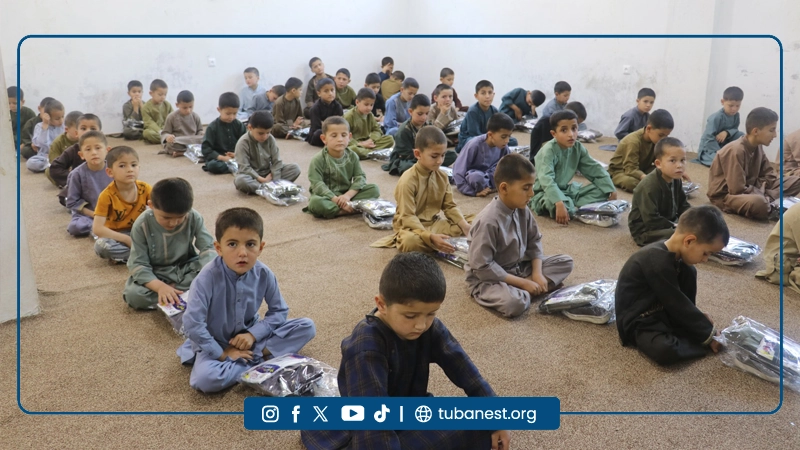 Orphan children receiving Eid clothes at Tuba Nest